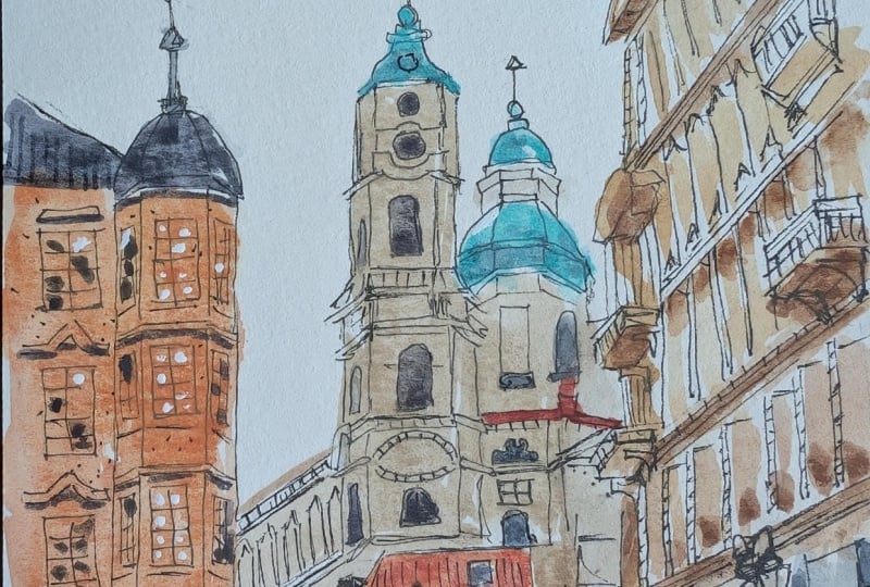 Sketching a detailed Prague street scene with pen, ink & watercolour