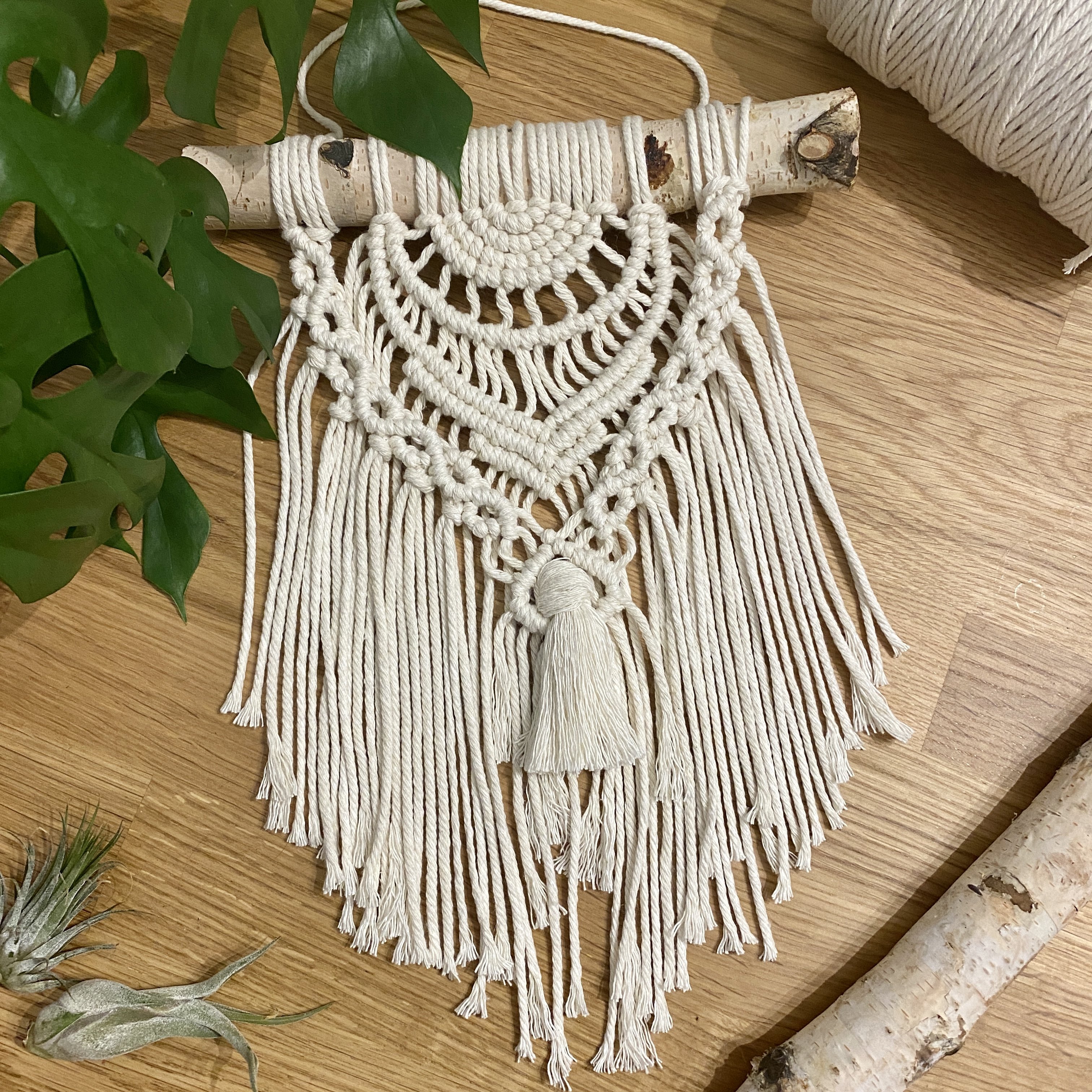 Learn how to make this small beautiful boho macrame wall hanging