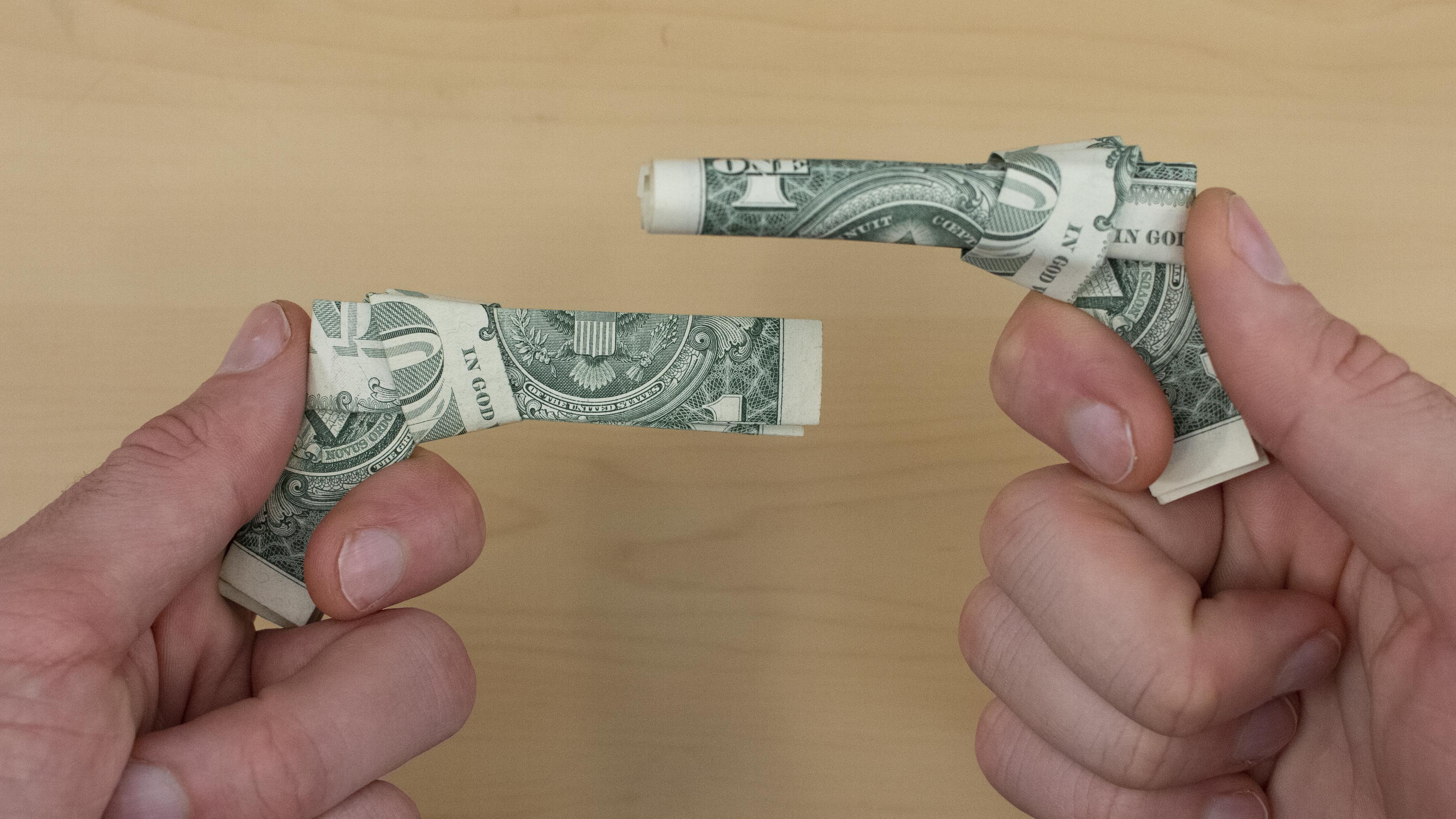  Learn to Fold a Dollar Origami Gun - $0.00 at Skillshare